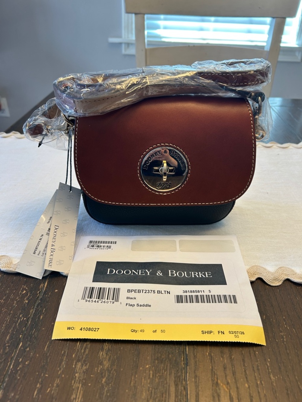 Dooney & Bourke Brown and Black Turnlock Flap Saddle Crossbody Bag